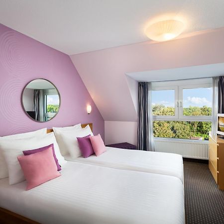 Hotel Uhu Garni โคโลญ ภายนอก รูปภาพ