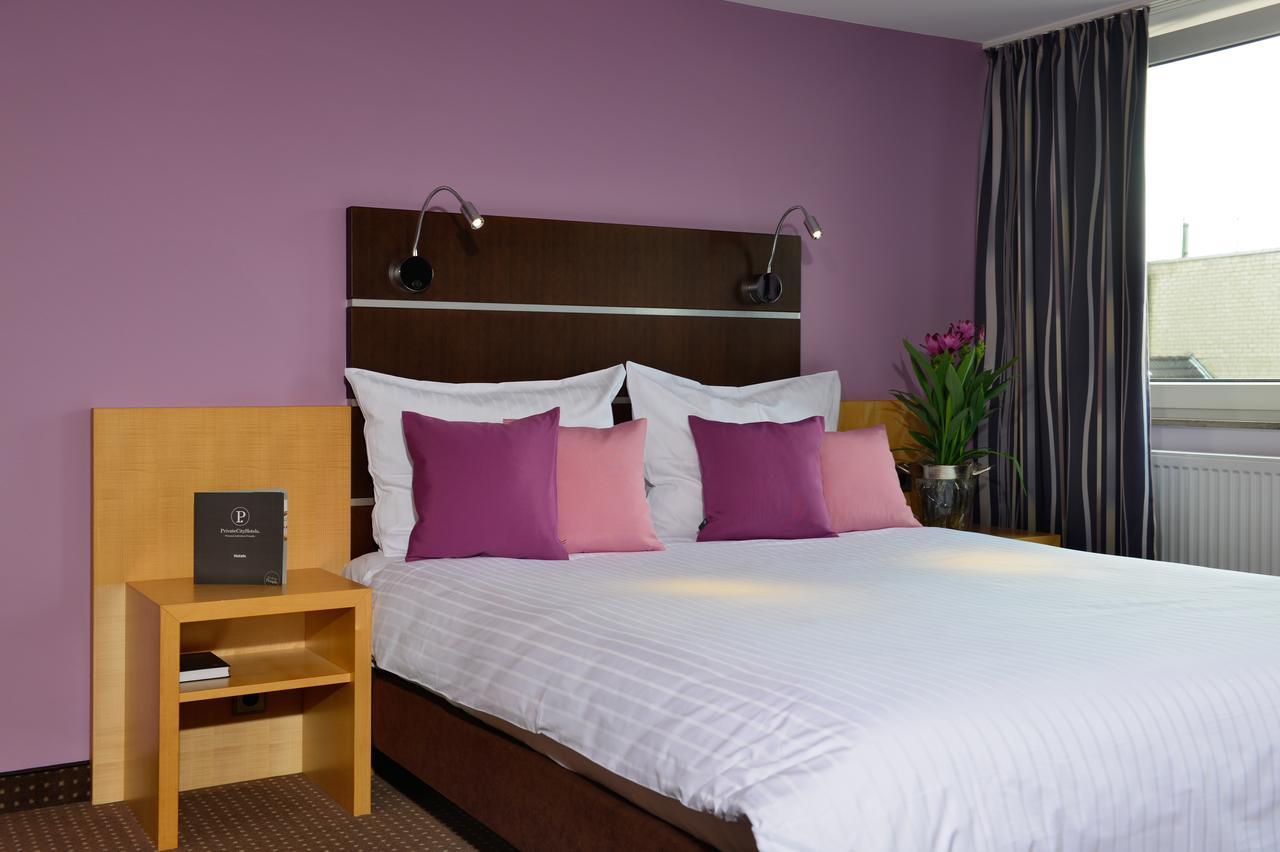 Hotel Uhu Garni โคโลญ ภายนอก รูปภาพ