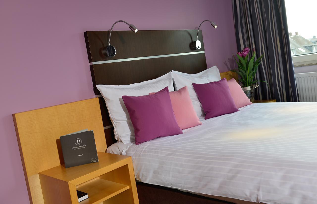 Hotel Uhu Garni โคโลญ ภายนอก รูปภาพ