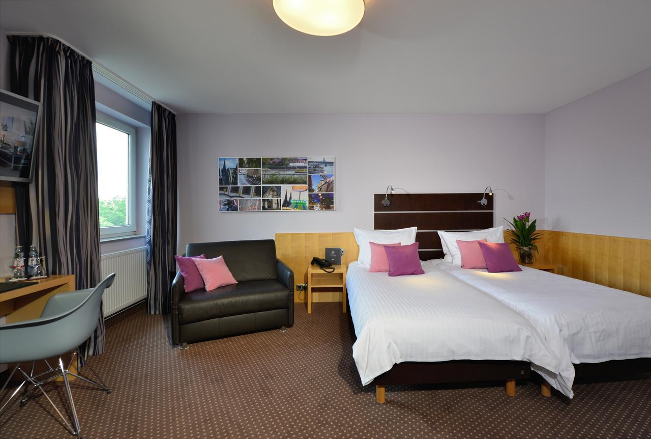 Hotel Uhu Garni โคโลญ ภายนอก รูปภาพ